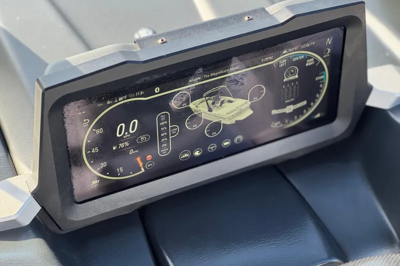 Slide: The Image of 2023 Malibu Wakesetter 21 LX dashboard display showing speed and system information. - 33