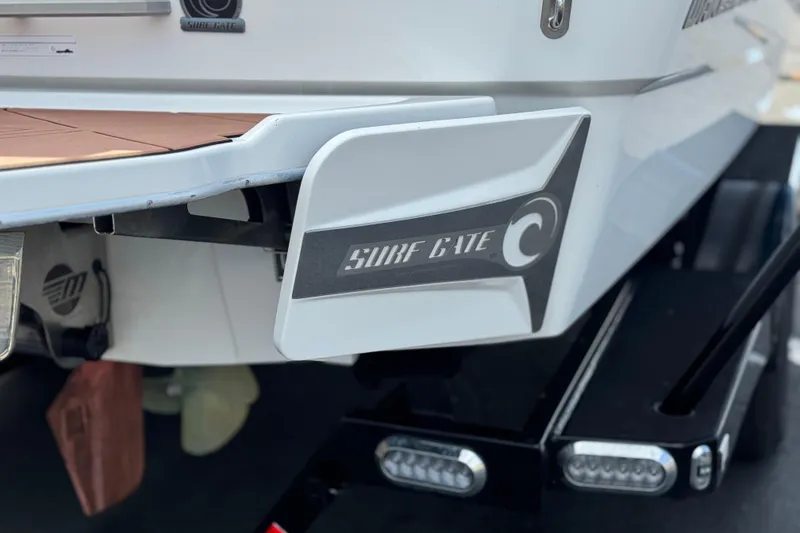 Slide: The Image of 2023 Malibu Wakesetter 21 LX with Surf Gate technology, rear view close-up. - 7
