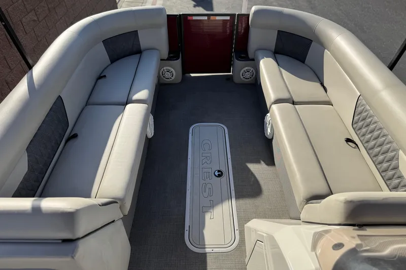 Slide: The Image of Interior of 2021 Crest Classic DLX 240 SLC pontoon boat with spacious seating. - 10