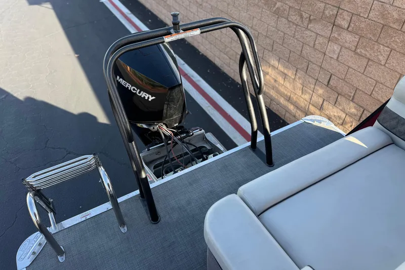 Slide: The Image of 2021 Crest Classic DLX 240 SLC boat with Mercury engine and swim ladder. - 23