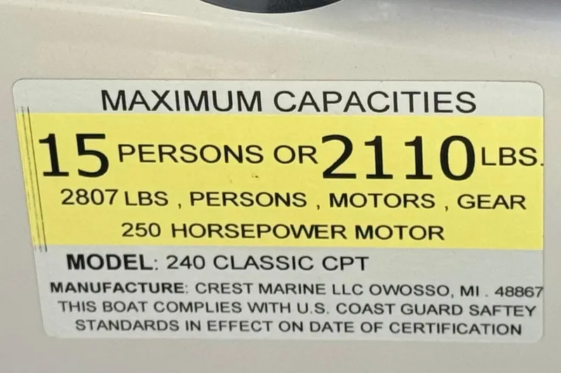 Slide: The Image of 2021 Crest Classic DLX 240 SLC boat capacity label, 15 persons or 2110 lbs, 250 HP motor. - 35