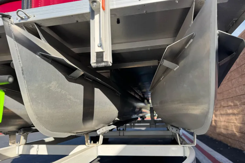 Slide: The Image of Underneath view of a 2021 Crest Classic DLX 240 SLC pontoon boat. - 4