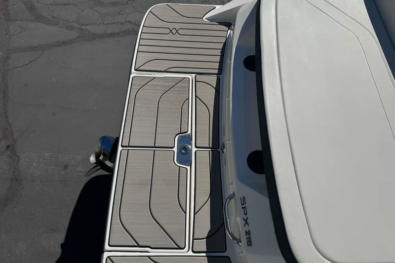 Slide: The Image of 2026 Sea Ray SPX 210 boat deck with sleek design and modern finish. - 6
