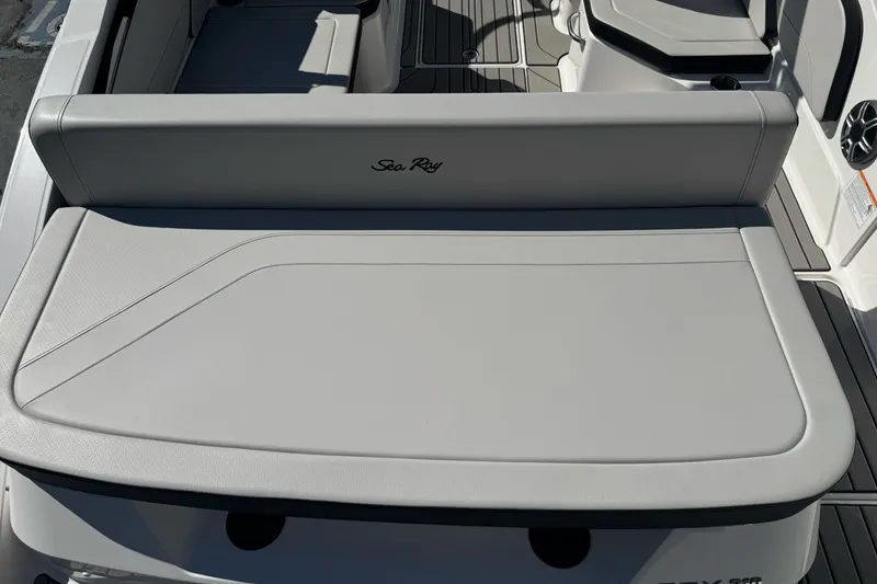Slide: The Image of 2026 Sea Ray SPX 210 boat interior with sleek seating and modern design. - 7