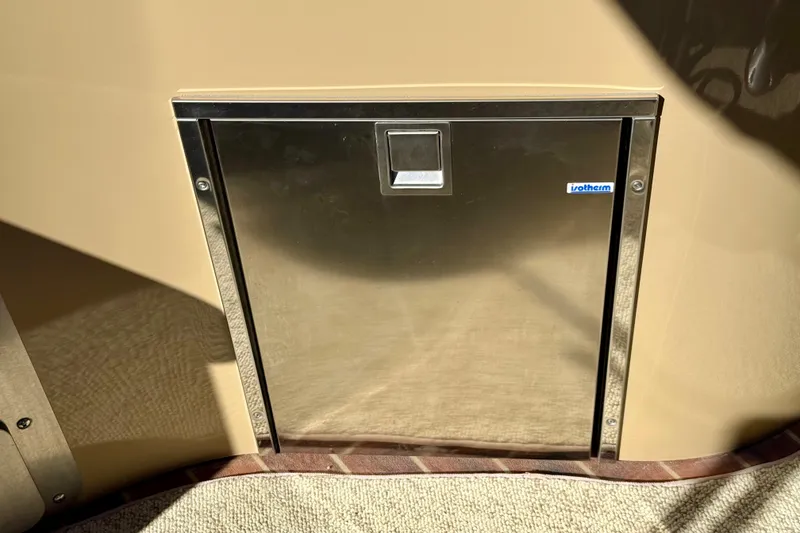 Slide: The Image of 2014 South Bay 724 E DLX TT boat with stainless steel Isotherm fridge. - 10