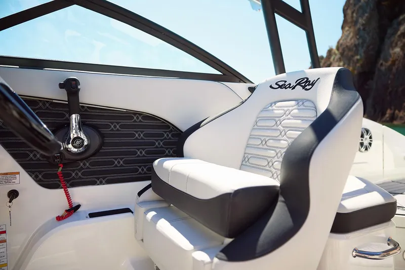 Slide: The Image of Manufacturer Provided Image: 2025 Sea Ray SPX 210 OB boat interior with stylish seating and modern design. - 23