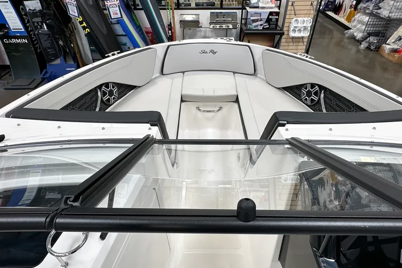 Slide: The Image of 2026 Sea Ray SPX 210 Outboard boat interior with sleek seating and modern design. - 9