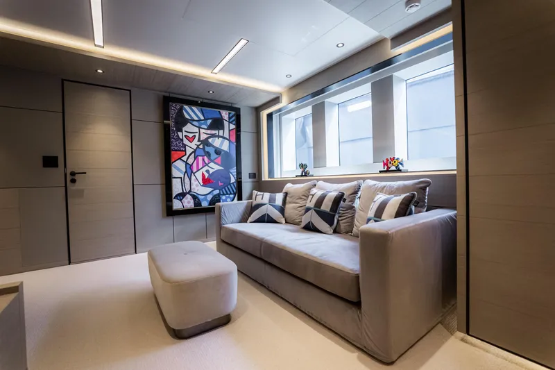 Slide: The Image of Modern yacht interior with abstract art, plush sofa, and stylish decor, Alpha Alfresco 125, 2020. - 27