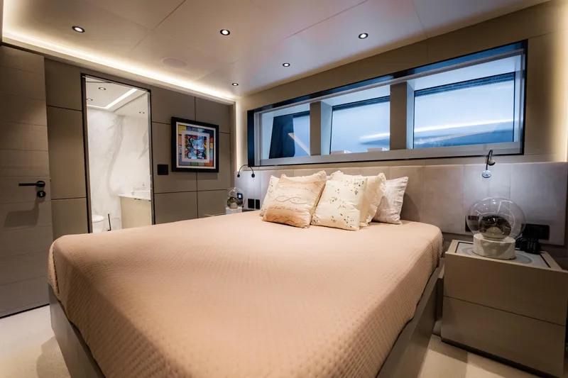 Slide: The Image of Luxurious bedroom interior on 2020 Alpha Alfresco 125 yacht, featuring modern design and ambient lighting. - 32