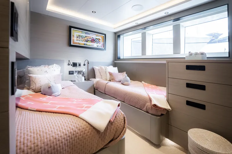 Slide: The Image of Luxurious twin bedroom in 2020 Alpha Alfresco 125 yacht, featuring modern decor and ample natural light. - 36