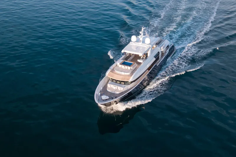 Slide: The Image of Luxurious 2020 Alpha Alfresco 125 yacht cruising on open water. - 5