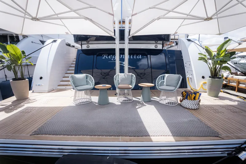 Slide: The Image of Luxurious 2020 Alpha Alfresco 125 yacht deck with stylish seating and potted plants. - 6