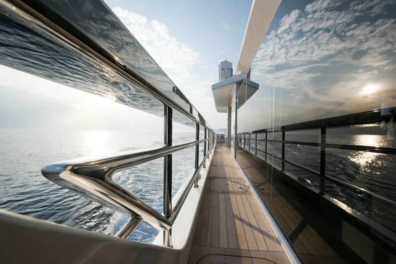 Slide: The Image of Deck view of Alpha Alfresco 125 yacht, 2020 model, at sunset. - 7