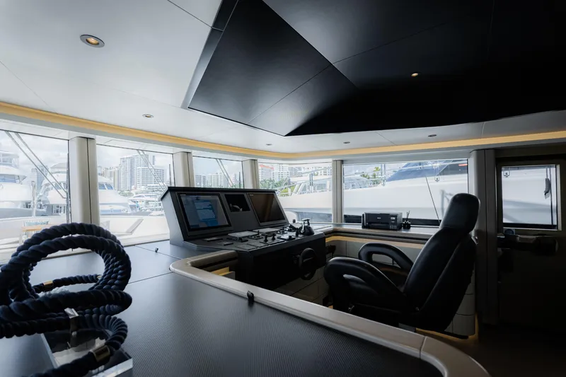 Slide: The Image of Modern yacht cockpit interior of 2020 Alpha Alfresco 125, featuring advanced navigation equipment. - 8