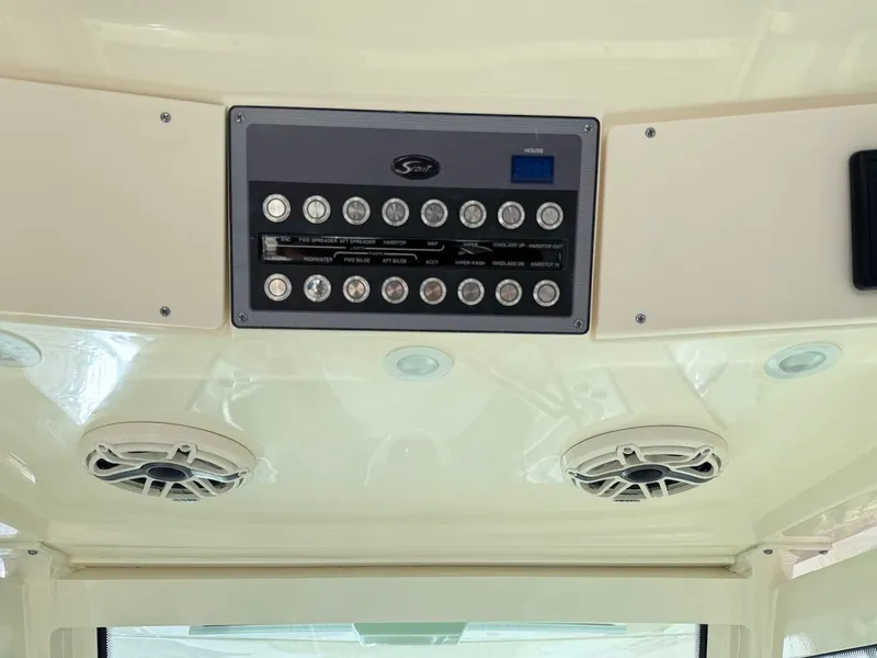 Slide: The Image of 2023 Scout 330 LXF control panel with speakers. - 32
