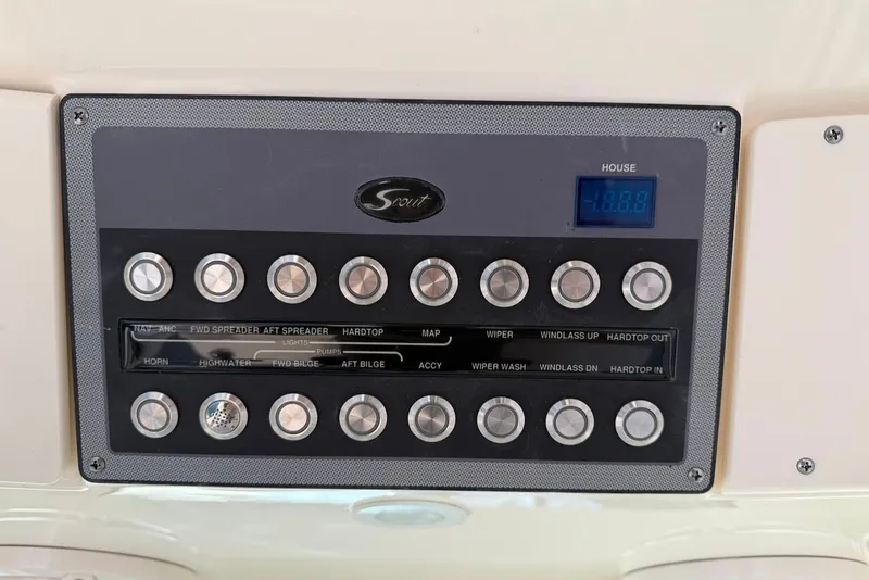 Slide: The Image of Control panel of the 2023 Scout 330 LXF boat. - 33