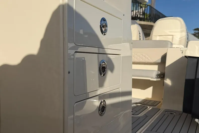 Slide: The Image of Interior of 2023 Scout 330 LXF with drawers and seating. - 37