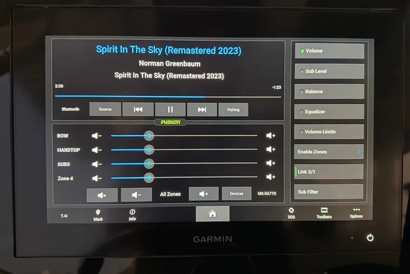 Slide: The Image of Garmin audio system on Scout 330 LXF, playing 'Spirit In The Sky'. - 41