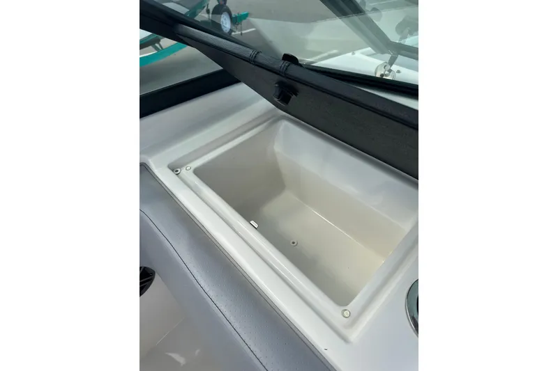 Slide: The Image of 2022 Sea Ray SPX 210 Outboard interior with sleek seating and modern design. - 21