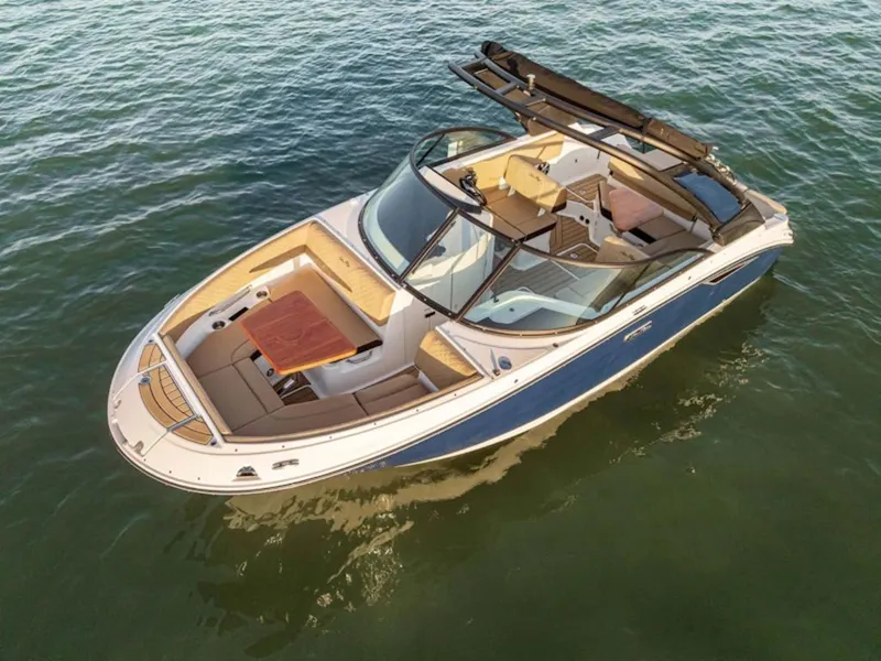 The Image of 2026 Sea Ray SDX 230 boat on calm water. - 1