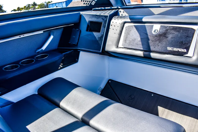 Slide: The Image of Interior of 2024 Scarab 285 ID boat with modern seating. - 10