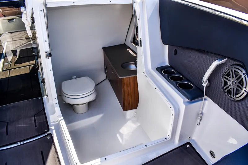 Slide: The Image of Anchor area of 2024 Scarab 285 ID boat at dock. - 13