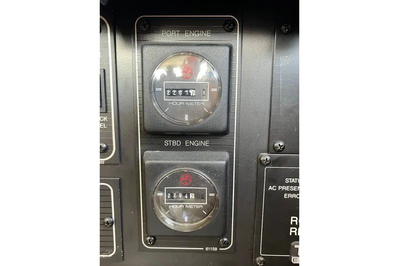 Slide: The Image of Hour meters on 1996 Bayliner 3788 Command Bridge Motoryacht dashboard, showing engine hours. - 41