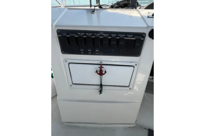 Slide: The Image of Control panel of 1996 Bayliner 3788 Command Bridge Motoryacht with anchor decoration. - 6