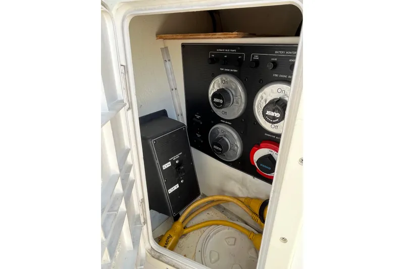Slide: The Image of Electrical panel of 1996 Bayliner 3788 Command Bridge Motoryacht with switches and cables. - 7