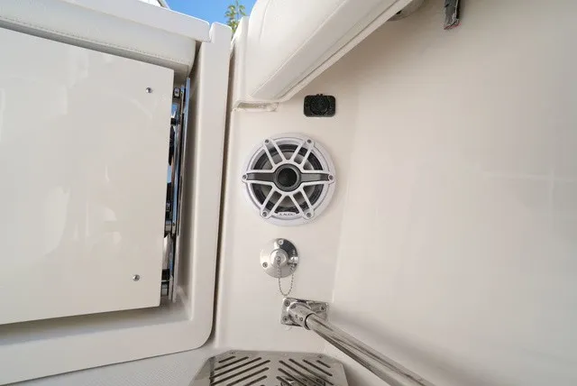 Slide: The Image of Close-up of a speaker and a mount on a boat. - 14