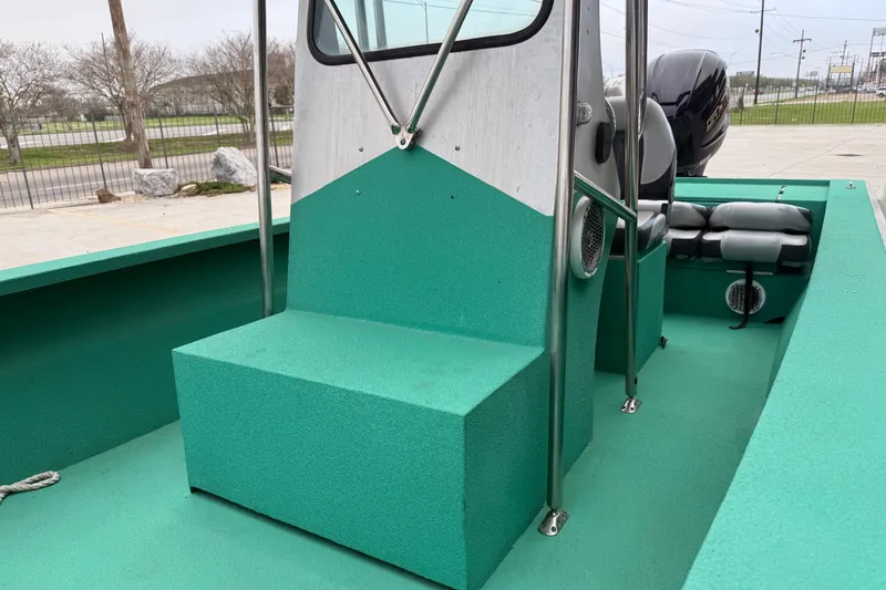 Slide: The Image of Green Charles Leonard 24 boat interior with seating and console, 2012 model. - 7