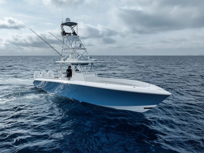 Slide: The Image of 2010 Bahama 41 boat cruising on open ocean under cloudy sky. - 17