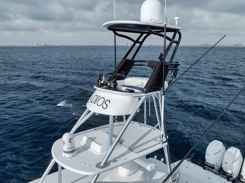 Slide: The Image of 2010 Bahama 41 boat with tower on open sea. - 31