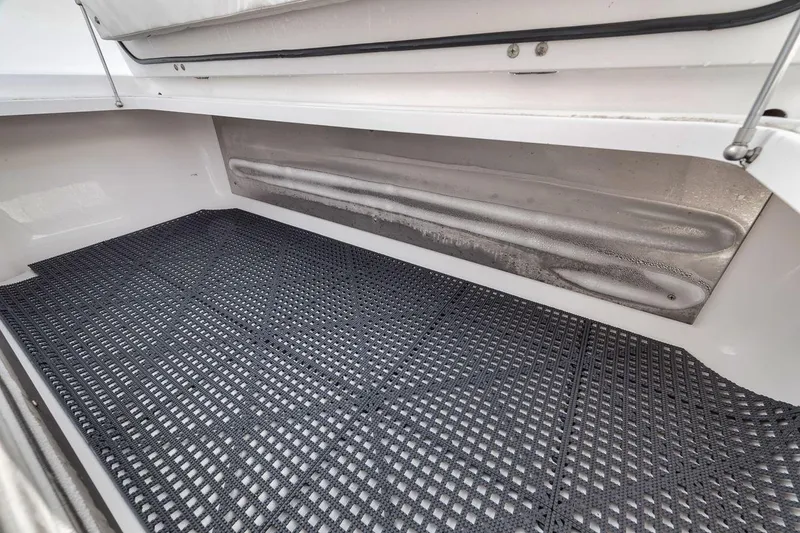Slide: The Image of Storage compartment of a 2010 Bahama 41 boat with non-slip flooring. - 45