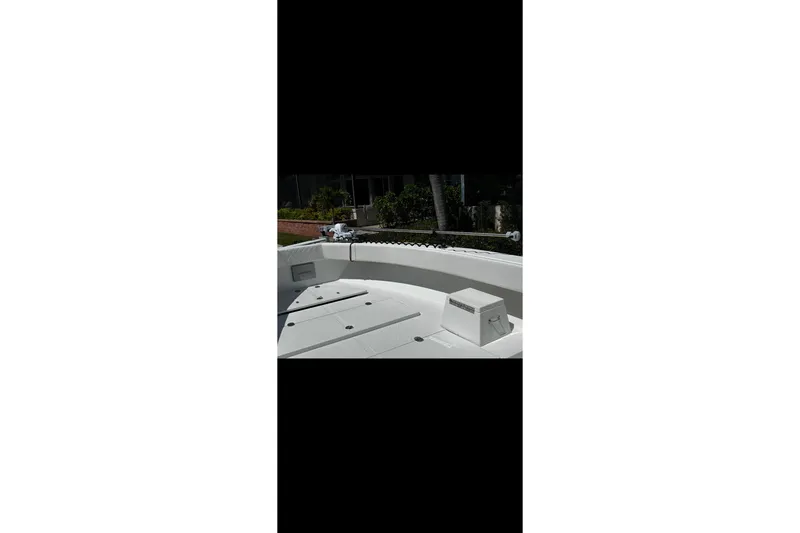 Slide: The Image of 2010 Bahama 41 boat deck with seating and storage compartments. - 84
