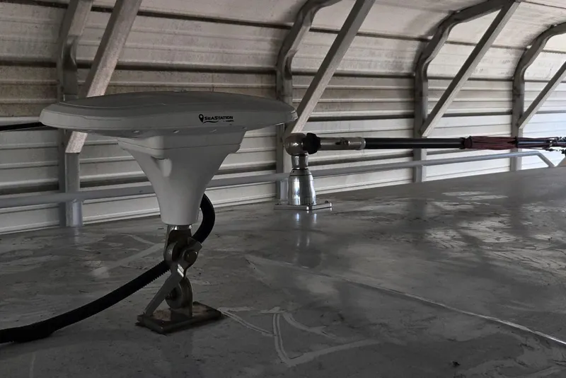 Slide: The Image of Rooftop view of 2025 Custom Boat 34 with mounted marine equipment. - 14