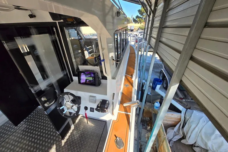 Slide: The Image of Modern 2025 Custom Boat 34 with advanced navigation system and sleek design. - 17