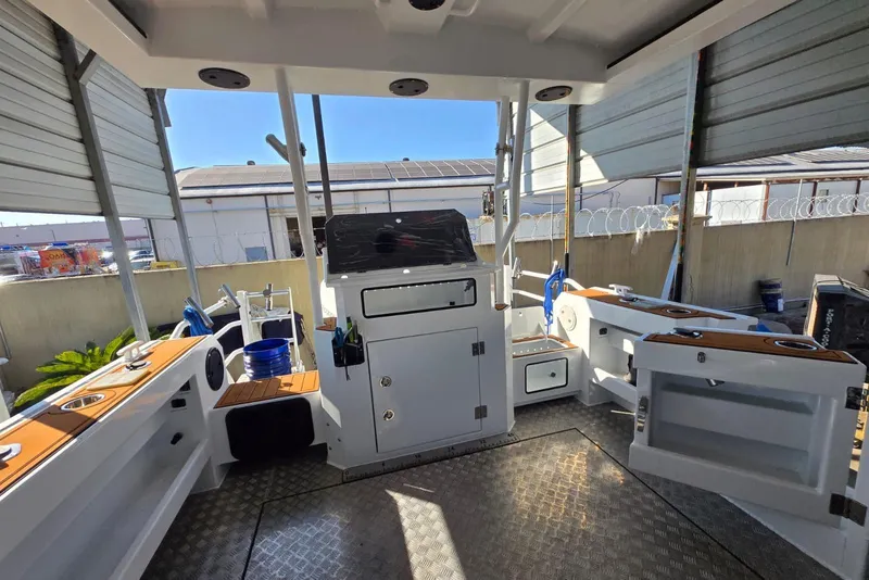 Slide: The Image of Interior of a 2025 Custom Boat 34, featuring modern design and ample storage. - 40