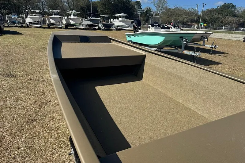 Slide: The Image of 2026 G3 Gator Tough 1548 VBW boat displayed outdoors on grass. - 10