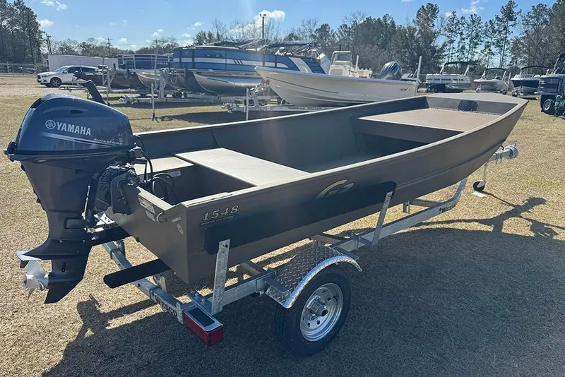Slide: The Image of 2026 G3 Gator Tough 1548 VBW boat on trailer with Yamaha motor in outdoor setting. - 5