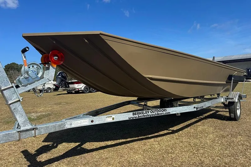 Slide: The Image of 2026 G3 Gator Tough 1548 VBW boat on trailer, displayed outdoors under clear sky. - 8
