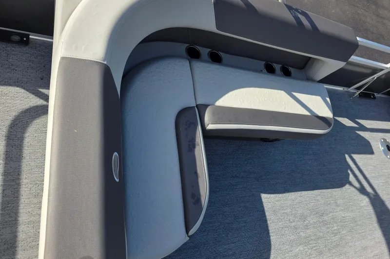 Slide: The Image of 2026 Sun Tracker Bass Buggy 16 XL Select boat seating with cup holders. - 3