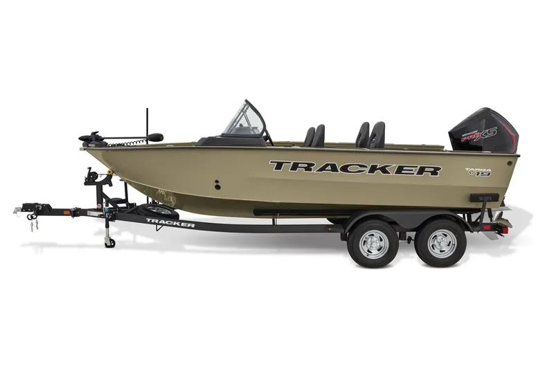 Slide: The Image of 2026 Tracker Targa V-19 Combo boat with Minn Kota motor in urban setting. - 2