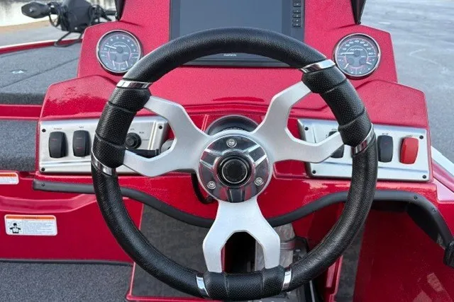 Slide: The Image of Steering wheel of 2026 Nitro Z19 XL Pro boat with dashboard controls. - 38