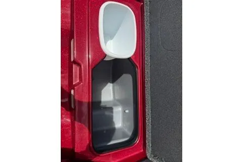 Slide: The Image of 2026 Nitro Z19 XL Pro boat storage compartment with red exterior and black interior. - 96