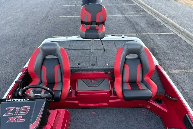Slide: The Image of 2026 Nitro Z19 XL Pro boat interior with red and black seating. - 46