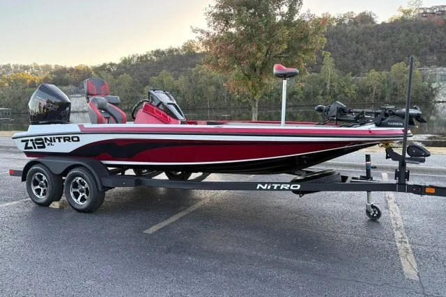 Slide: The Image of 2026 Nitro Z19 XL Pro boat on trailer, parked outdoors with scenic background. - 4