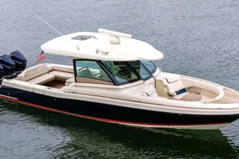 Slide: The Image of 2023 Chris-Craft Calypso 35 boat on water, featuring sleek design and modern amenities. - 4