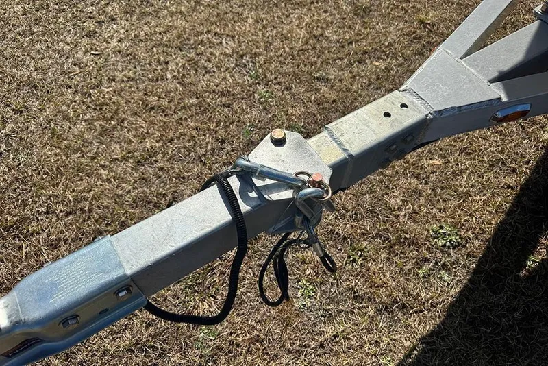 Slide: The Image of Trailer hitch of a 2026 G3 Bay 17 on dry grass. - 10