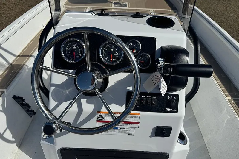 Slide: The Image of Steering console of 2026 G3 Bay 17 boat with gauges and controls. - 26
